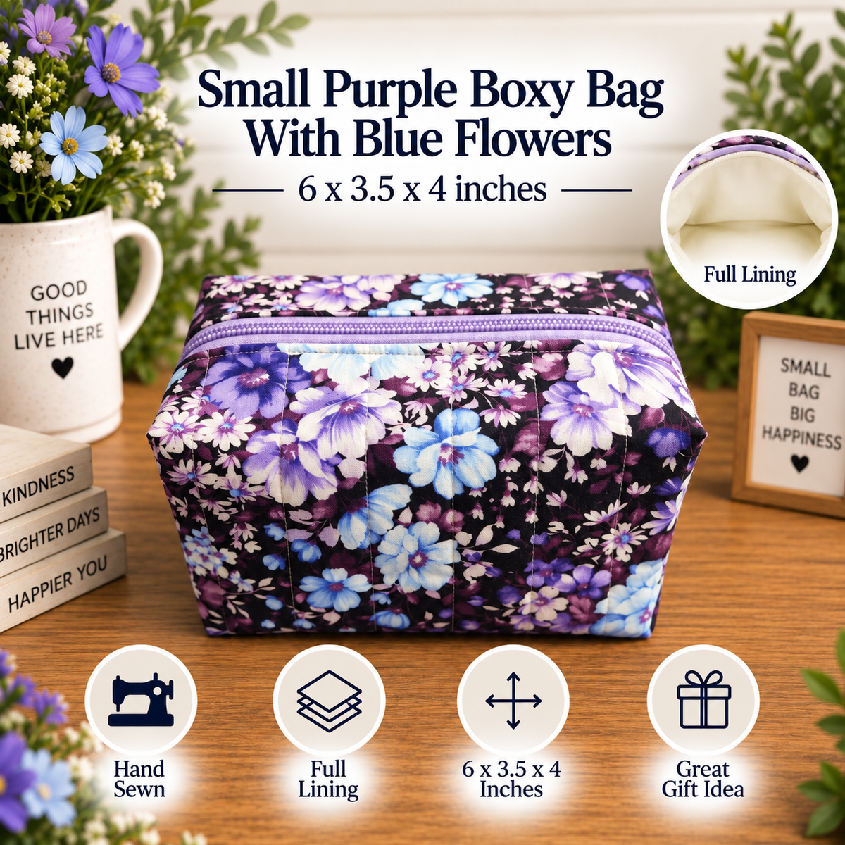 A small purple floral boxy bag with blue flowers, shown on a wooden table with decorative props including a mug, flowers, and a small sign. Text at the top reads 'Small Purple Boxy Bag With Blue Flowers' and '6 x 3.