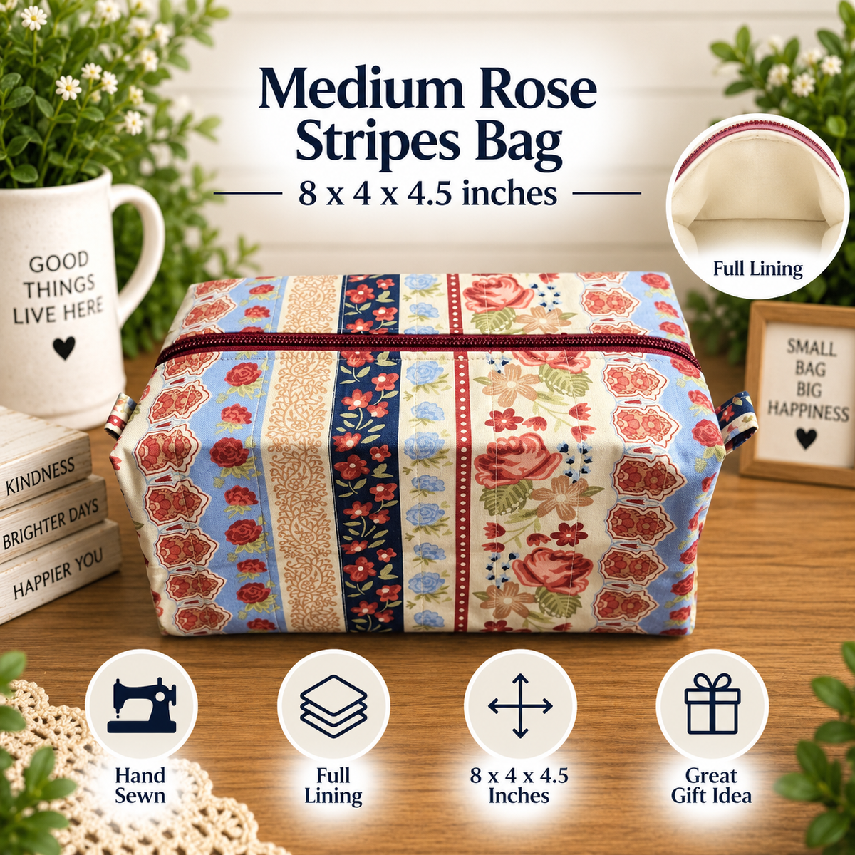 A fabric storage bag with a large rose and floral stripe pattern, shown on a wooden table with decorative props. The text at the top reads 'Medium Rose Stripe Boxy Bag - 8 x 4 x 4.5 inches' and there are feature icons at the bottom for 'Hand Sewn', 'Full Lining', '8 x4 x4.5 Inches', and 'Great Gift Idea'.