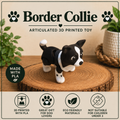 Border Collie Flexi toy on a wood round sitting on a table with greenery
