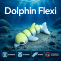 A 3D-printed articulated dolphin toy underwater, featuring a light green and white segmented body. The image includes text overlays reading 'Dolphin Flexi' and four feature badges at the bottom indicating '3D PRINTED', 'PLA MATERIAL', 'ARTICULATED', and 'NOT SUITABLE FOR CHILDREN UNDER 3'.