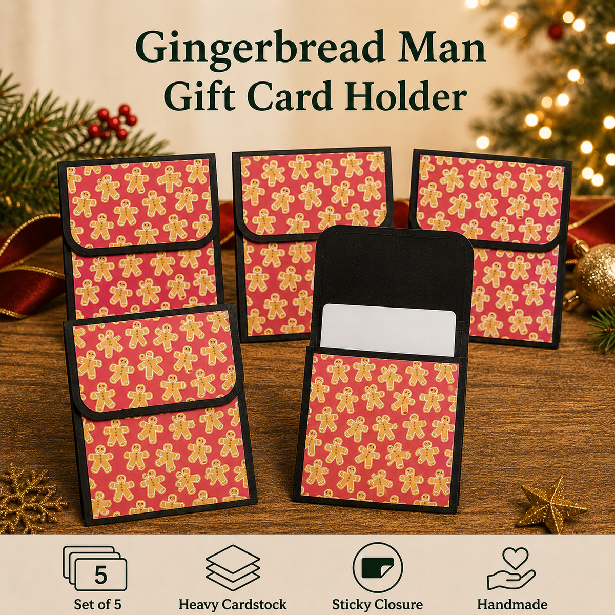 Five gingerbread man patterned gift card holders arranged on a wooden surface with holiday decorations in the background. The set includes one open holder showing a white card slot and four closed holders with flap closures.