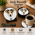 Four round 3d printed coasters with with a cork backing with printed Jack Russell Terrier dog faces and paw prints, shown on a wooden table with a mug of coffee and a small plant. Text highlights eco-friendly PLA plastic, set of 4, cork bottoms, holder function, and gift appeal.