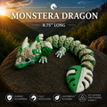 A 3D-printed articulated monstera dragon toy in green and white, resting on a dark rock with a mountain sunset background. Text overlays read 'MONSTERA DRAGON' and '8.