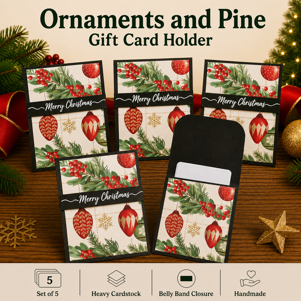 Five Christmas-themed gift card holders displayed on a wooden surface with holiday decorations. The holders feature a festive green pine branch and red ornament pattern, a black 'Merry Christmas' banner, and a black belly band closure.