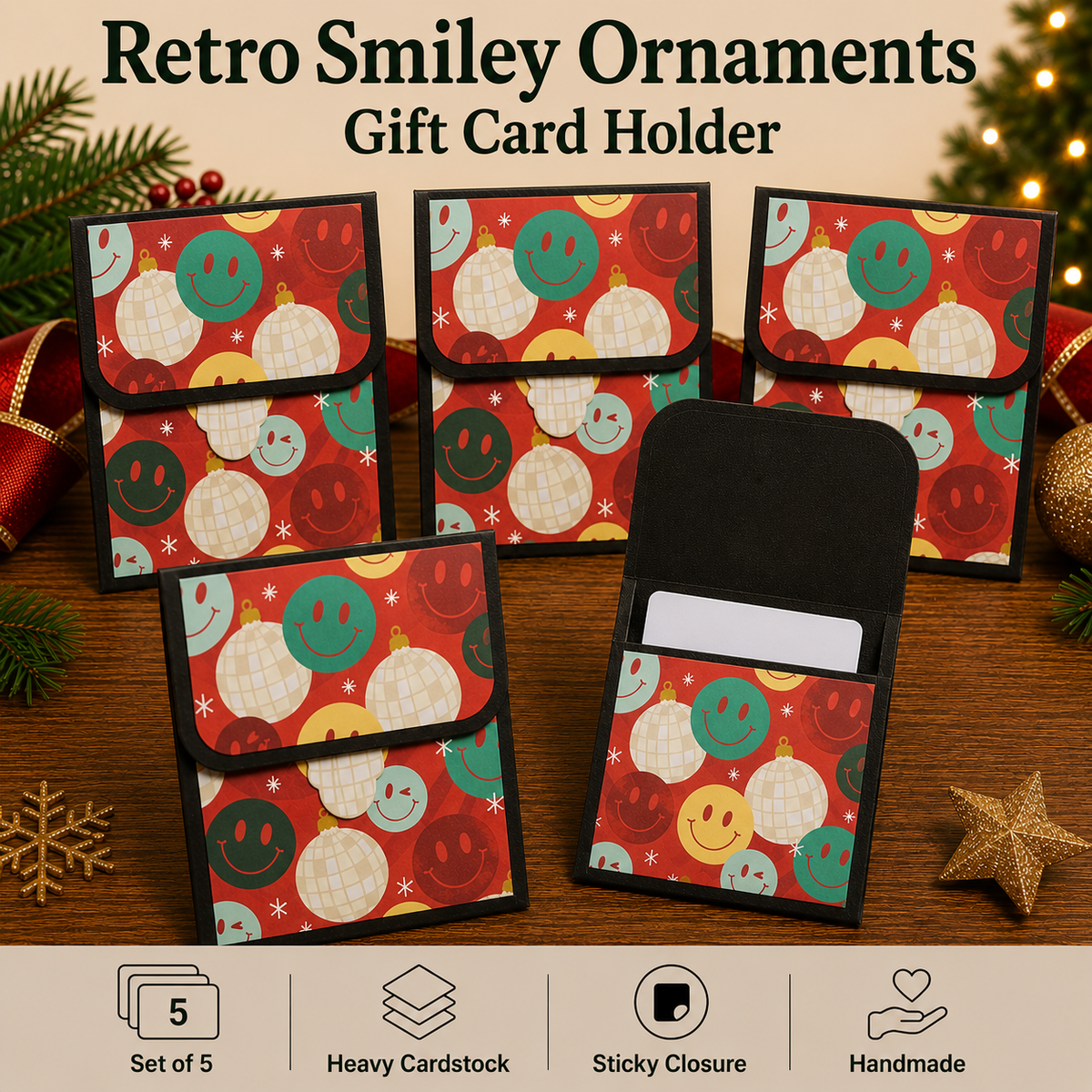Five retro-themed smiley face ornament gift card holders arranged on a wooden surface with holiday decorations. The holders feature a red background with colorful smiley faces and ornaments, black borders, and a black interior.