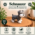 A gray and white 3D-printed articulated dog toy labeled 'Schnauzer' displayed on a round wood slice. The image includes marketing text, paw print icons, and feature badges on a clean, light background with decorative plants.
