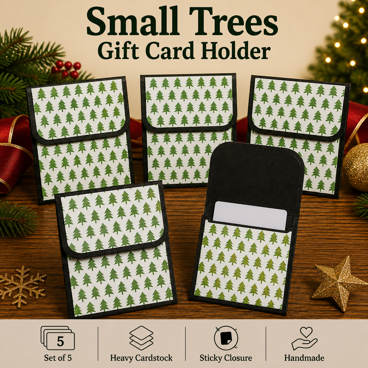 Five small gift card holders with a green Christmas tree pattern on a white background, shown on a wooden surface with holiday decorations. One holder is open to show the interior card slot.