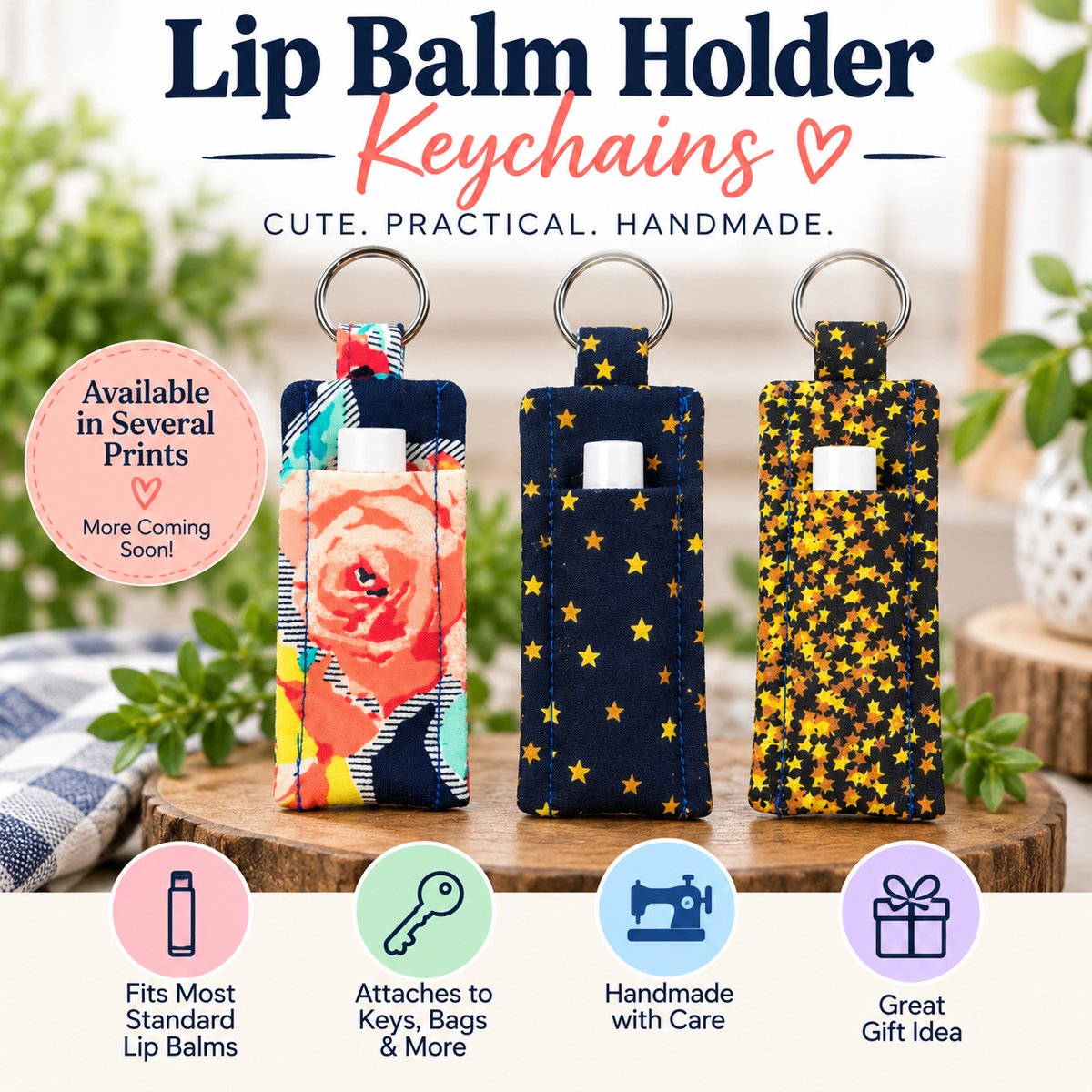 Three handmade lip balm keychains displayed on a wooden stand with promotional text and icons. The keychains feature different prints: a floral rose print, a navy blue star print, and a yellow star print.